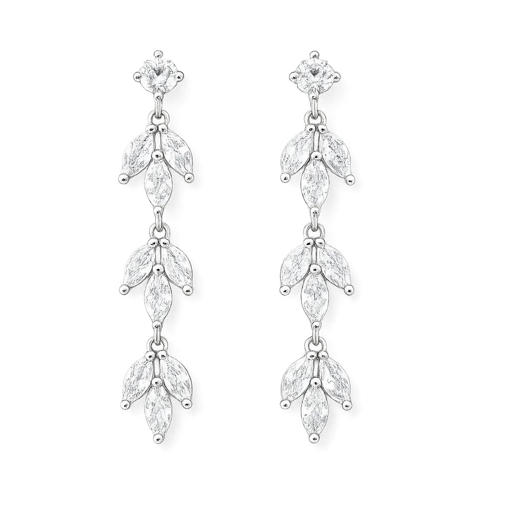 Pair of silver earrings with clear gemstones on a white background