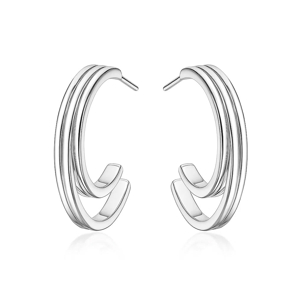 Pair of silver hoop earrings on a white background