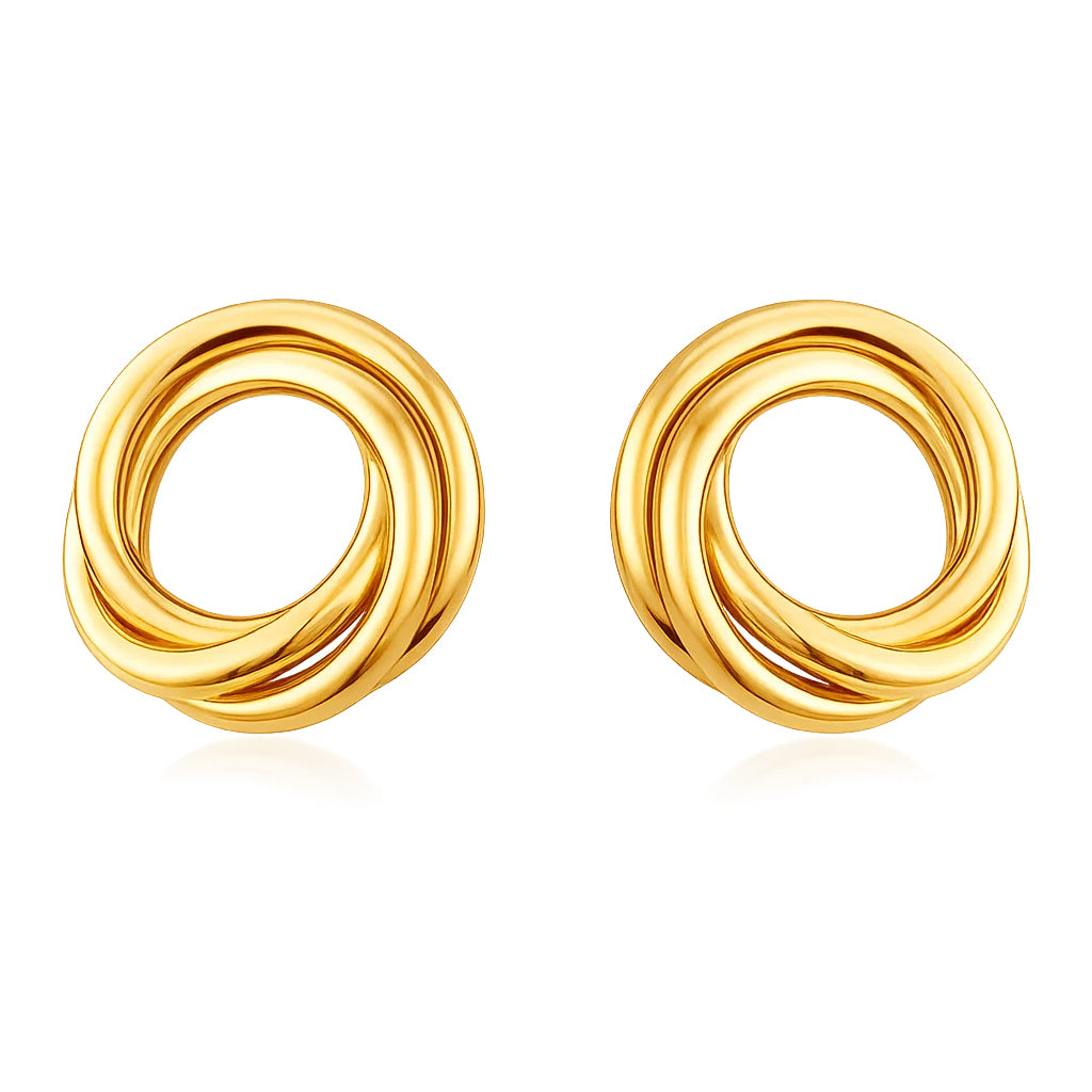 Pair of gold spiral earrings on a white background