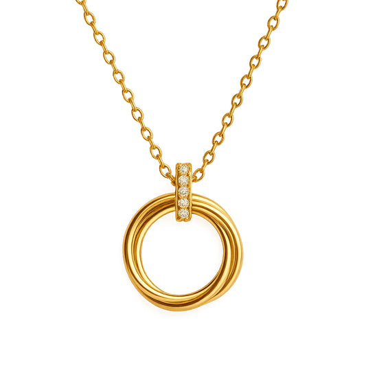 Gold necklace with a circular pendant on a white background