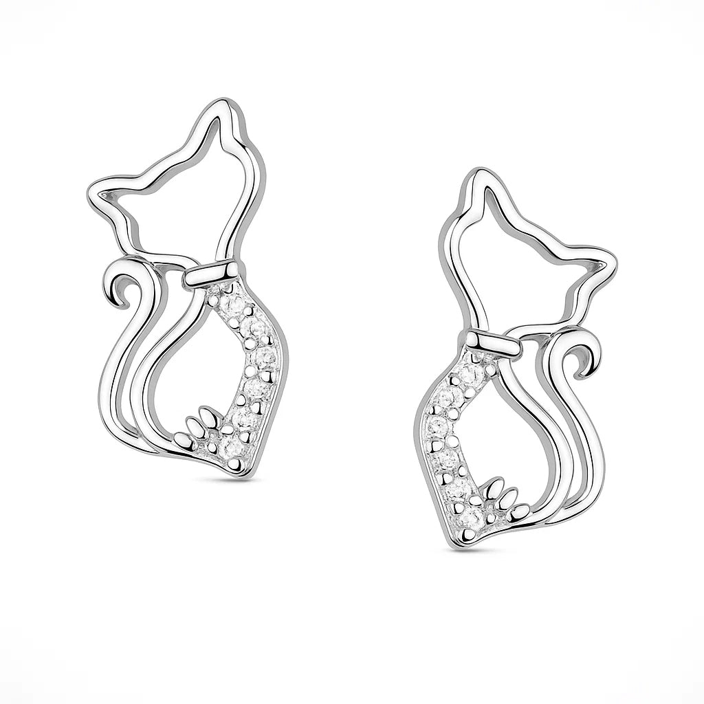 Silver cat-shaped earrings with embedded stones on a white background