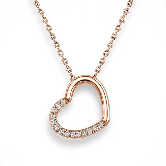 Rose gold heart-shaped necklace with stones on a white background