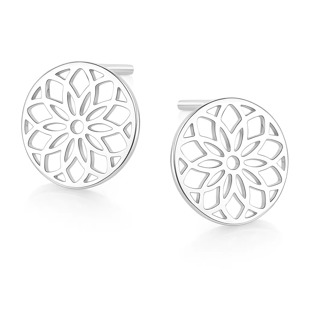 Pair of silver floral earrings on a white background
