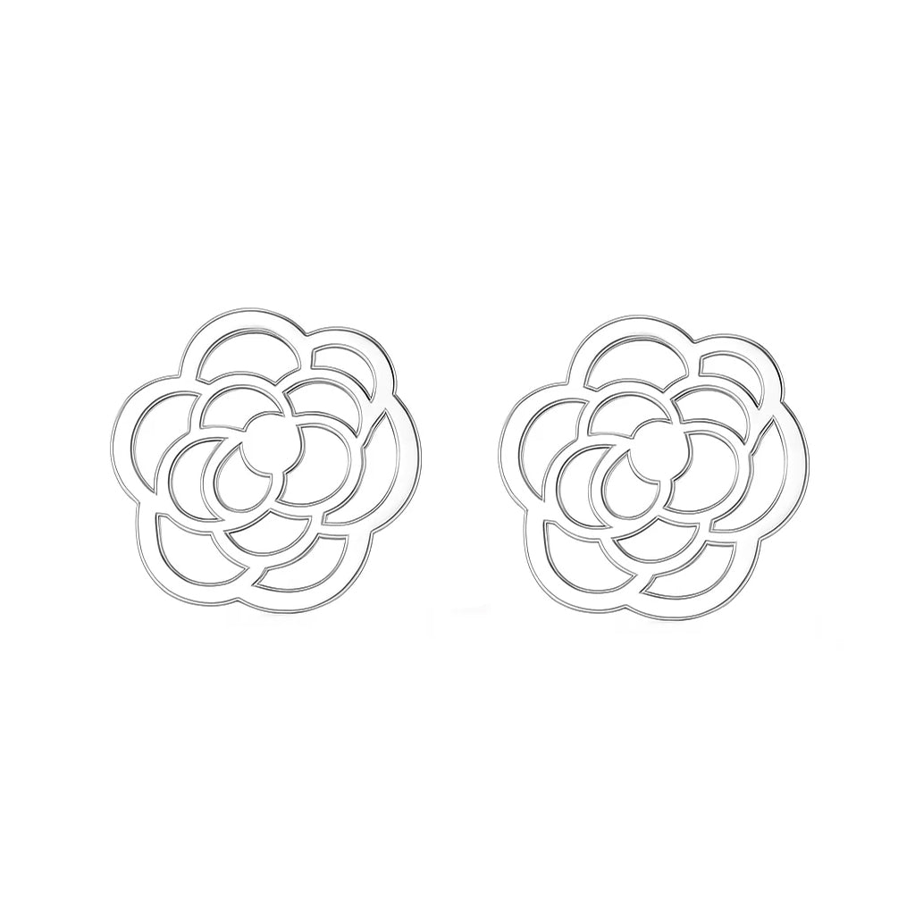 Pair of floral-shaped earrings on a white background