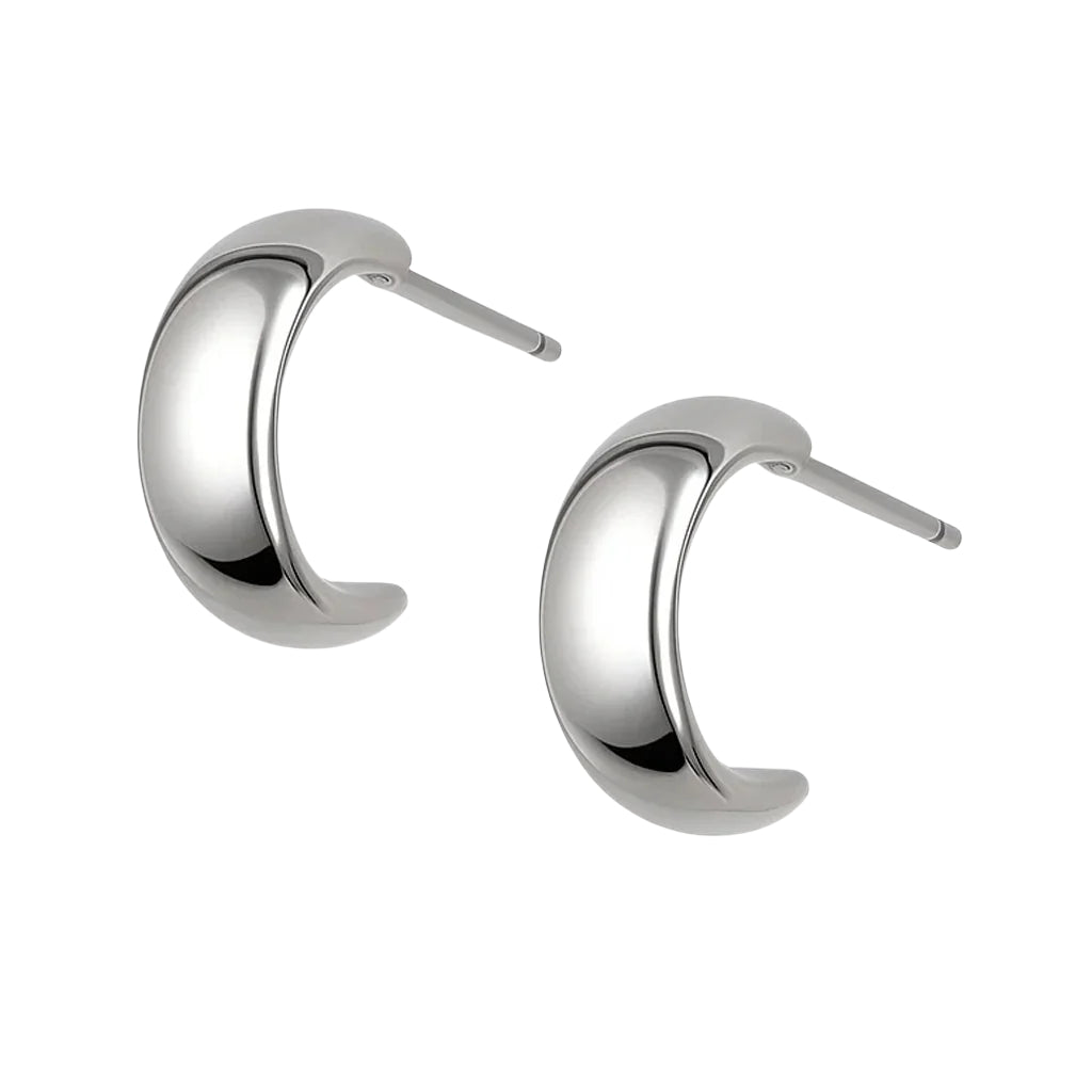 Pair of silver hoop earrings on a white background