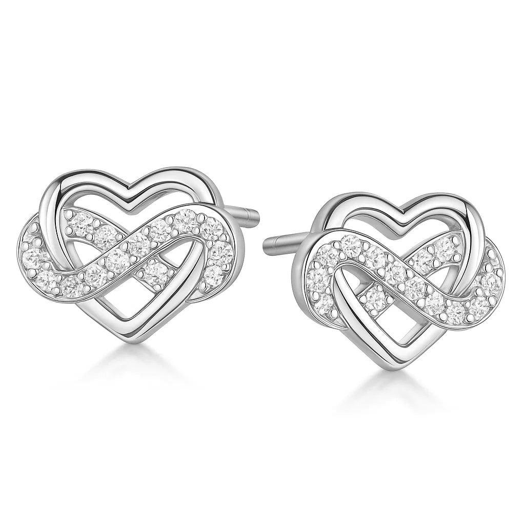 Silver heart-shaped earrings with interlocking design on a white background