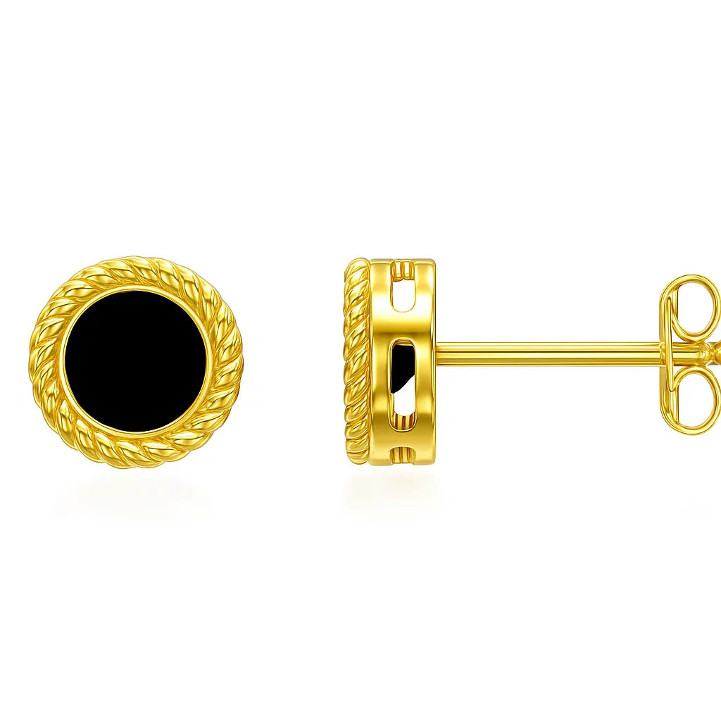 Gold earring with black center on a white background