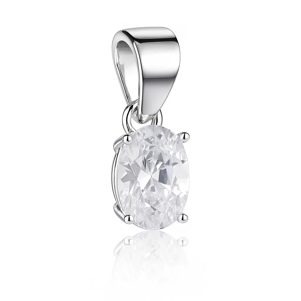 Silver pendant with a clear gemstone on a white background