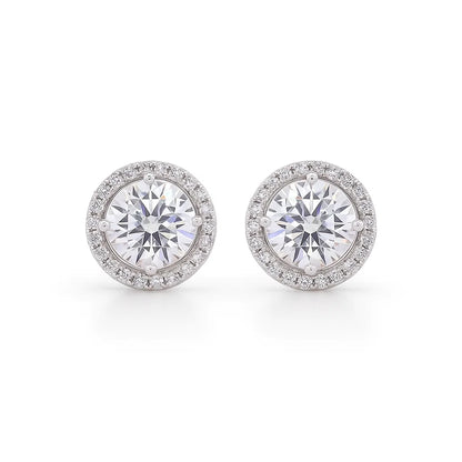 Pair of moissanite stud earrings on a white background