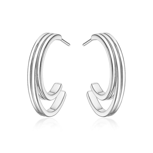 Pair of silver hoop earrings on a white background