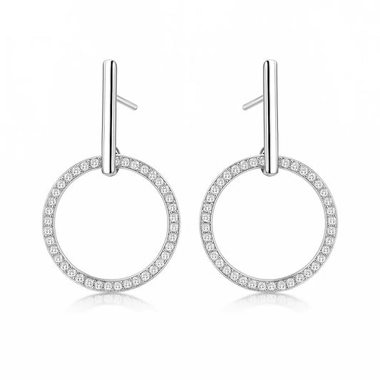 Pair of silver hoop earrings with small zirconia on a white background