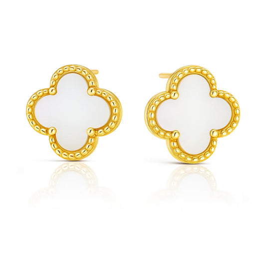 Gold and white clover-shaped earrings on a white background