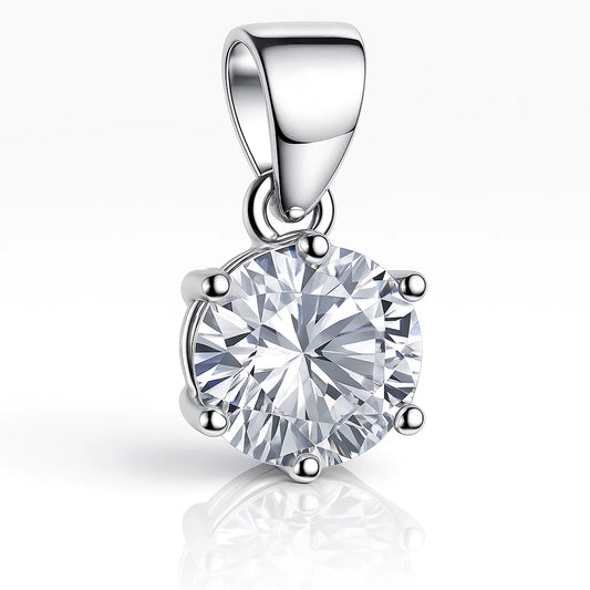 Silver pendant with a large clear gemstone on a white background