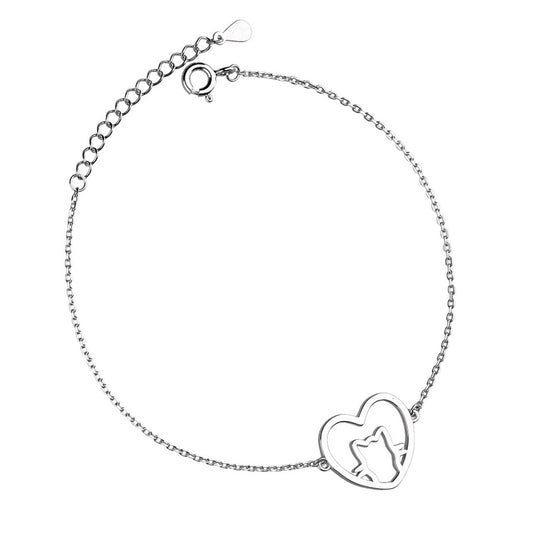 Silver bracelet with a heart-shaped charm on a white background