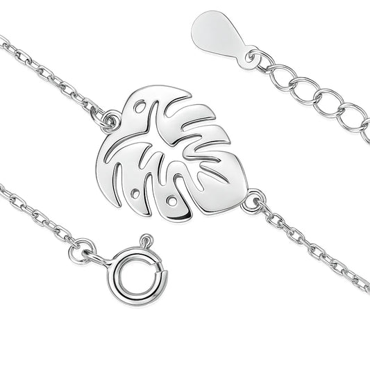 Silver bracelet with leaf design on a white background