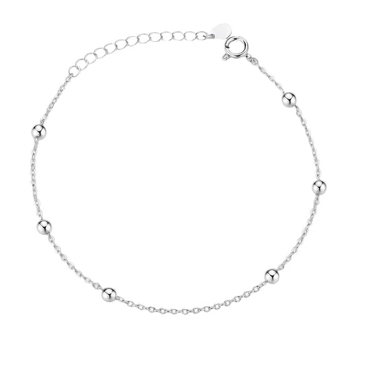 Silver bracelet with small beads on a white background