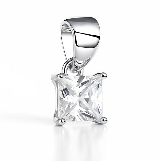 Silver pendant with a large clear gemstone on a white background