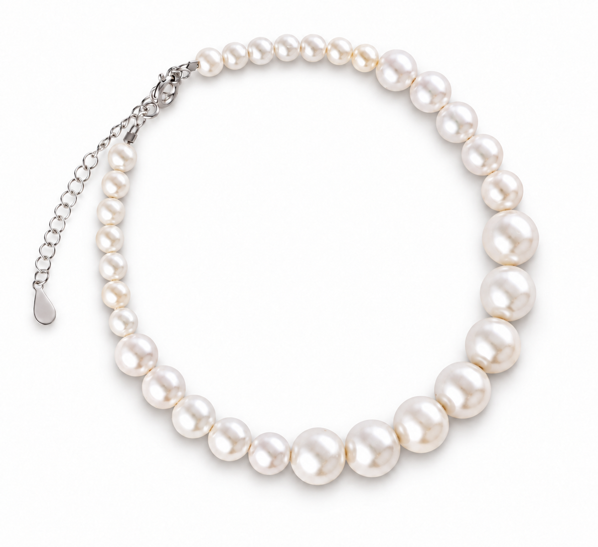 A strand necklace made of large, irregular white freshwater pearls with a silver-tone clasp and extender chain, shown on a clean white background.