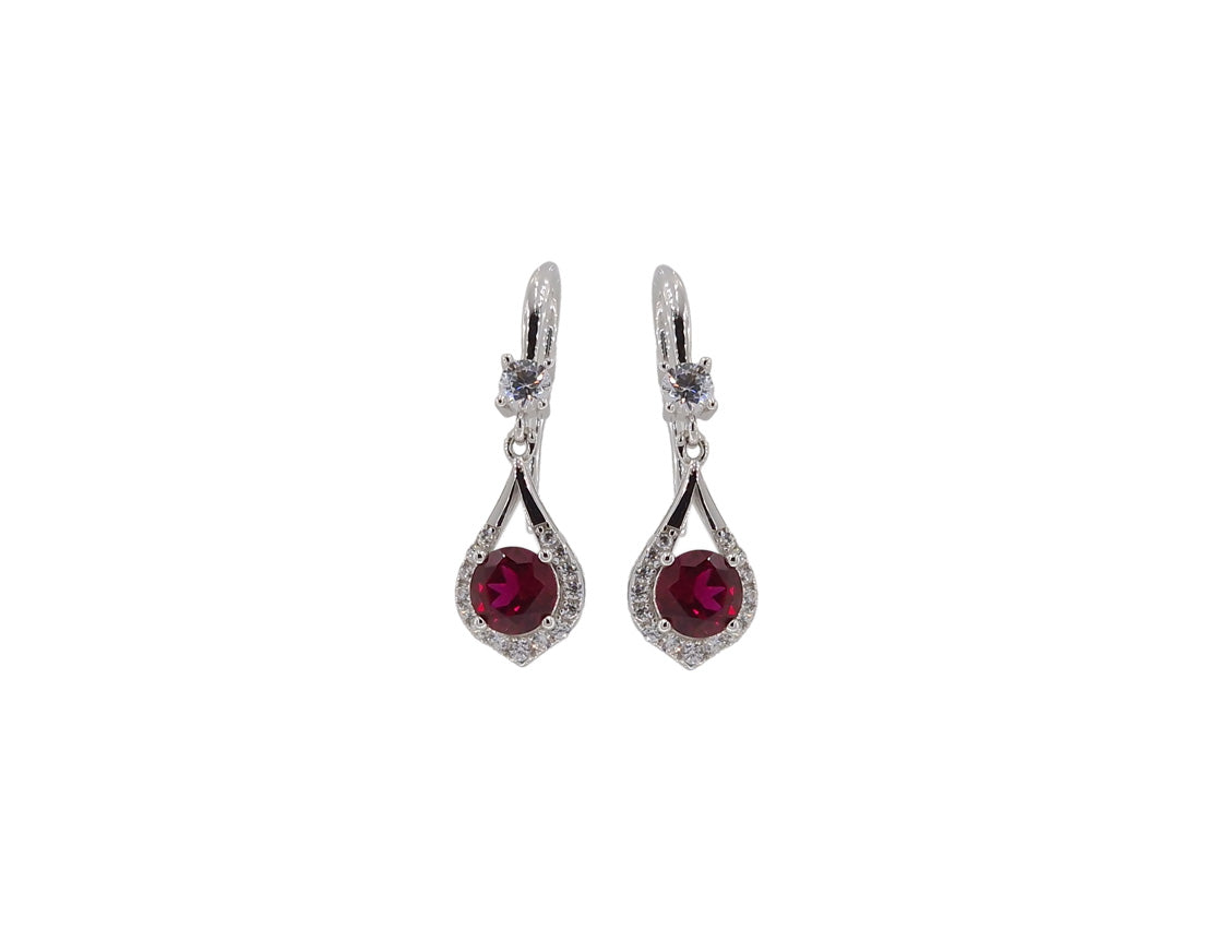 Rhodium-plated silver earrings showcasing synthetic rubies surrounded by cubic zirconia stones. Amona Jewellery