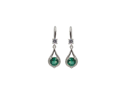 Glamorous silver earrings featuring synthetic emerald stones set within a halo of cubic zirconia. Amona Jewellery